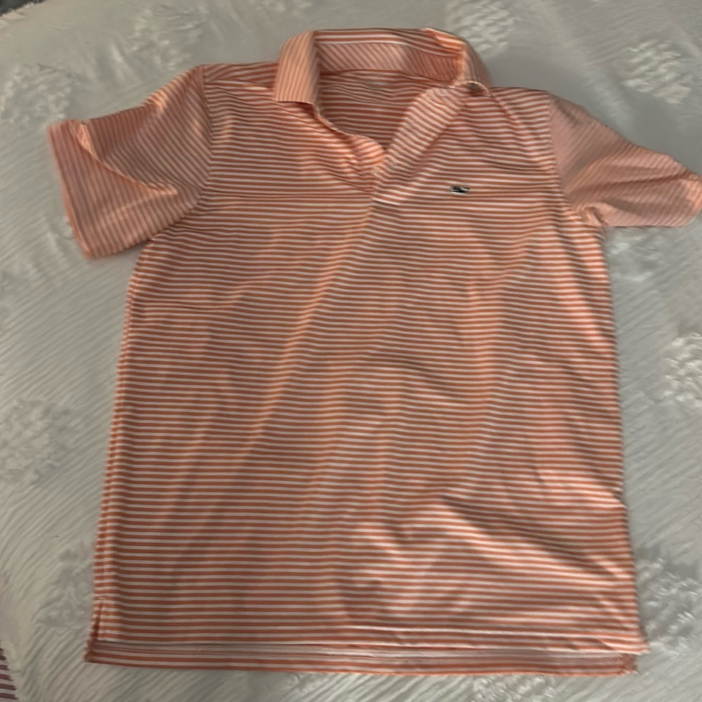 This is a boys XL shirt which I think is a 14/16. clean, smoke/pet free home!